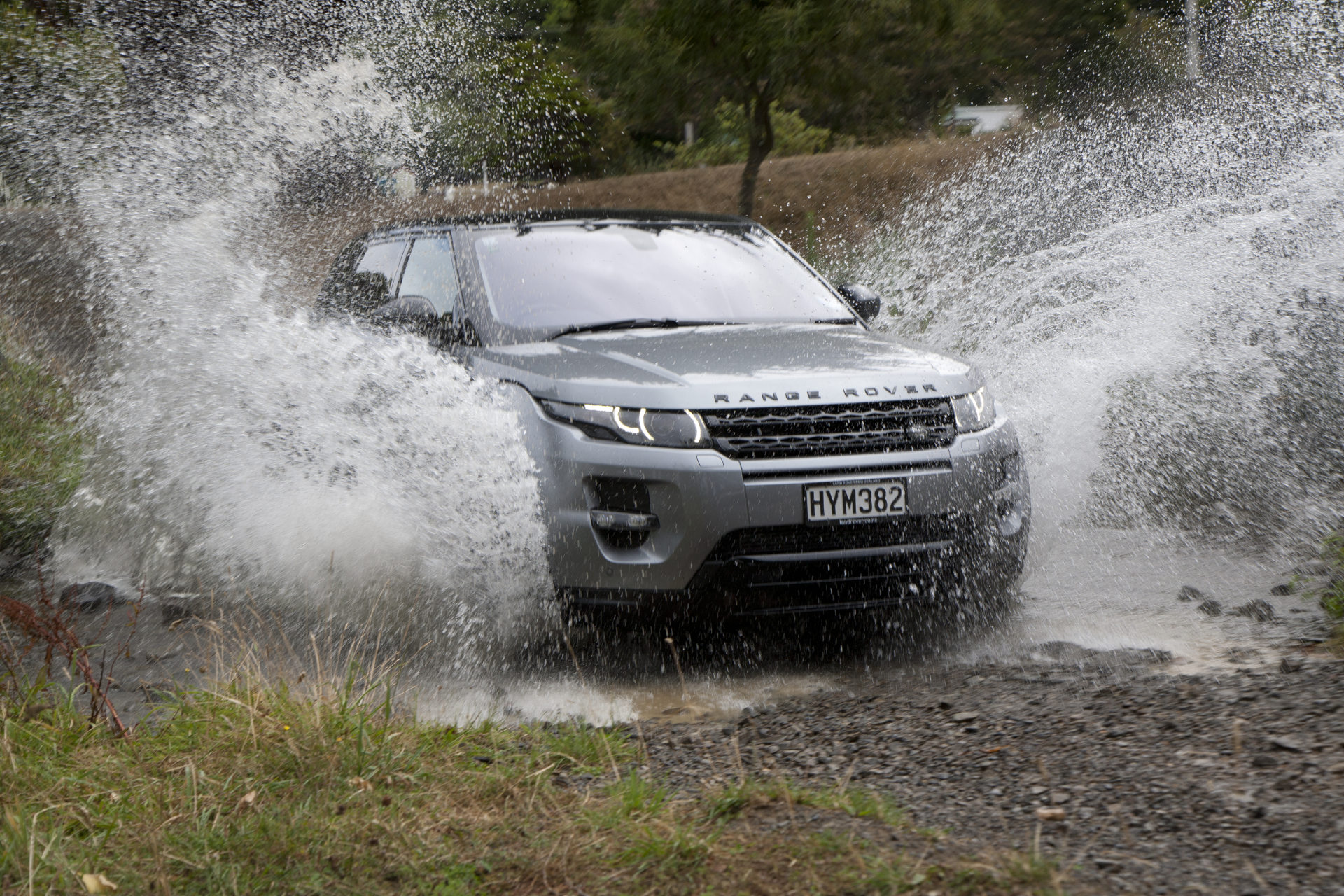 Range Rover Evoque going through water.