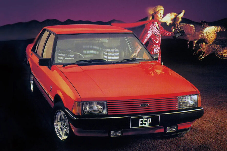 A red Ford Falcon ESP, 1982 print advertisement image. Also features a female model and a falcon.